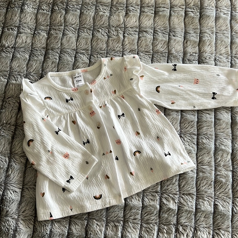 12 m Carters long sleeved shirt with kitten, rainbow and bow detail.
